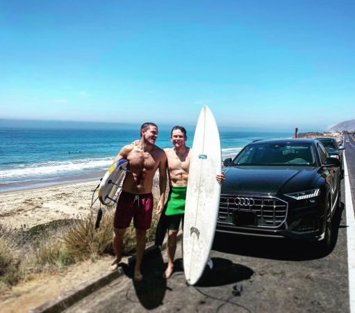 Billy is with his friend at beachside.